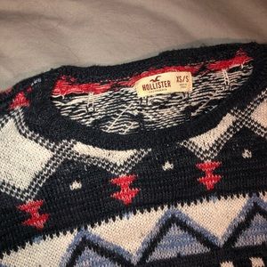 Patterned blue and red sweater
